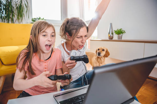 Mother and daughter gaming together